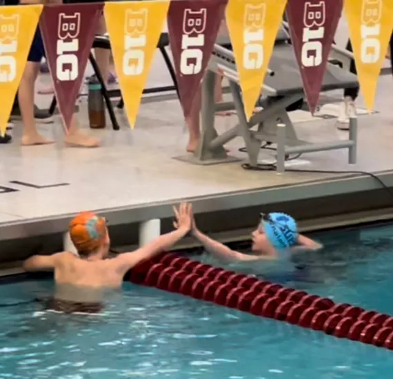 swimmer high five